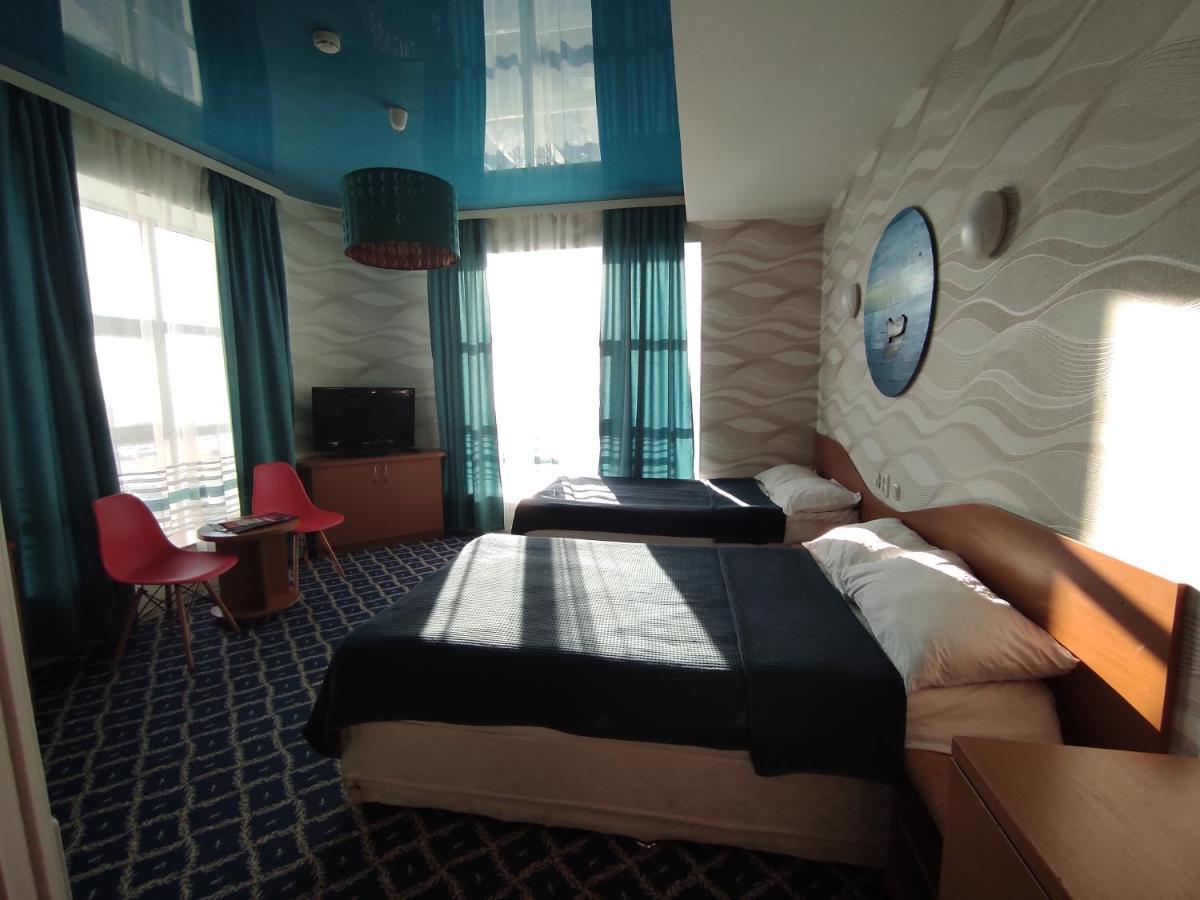 Three Dolphins Hotel Aktau  Extérieur photo